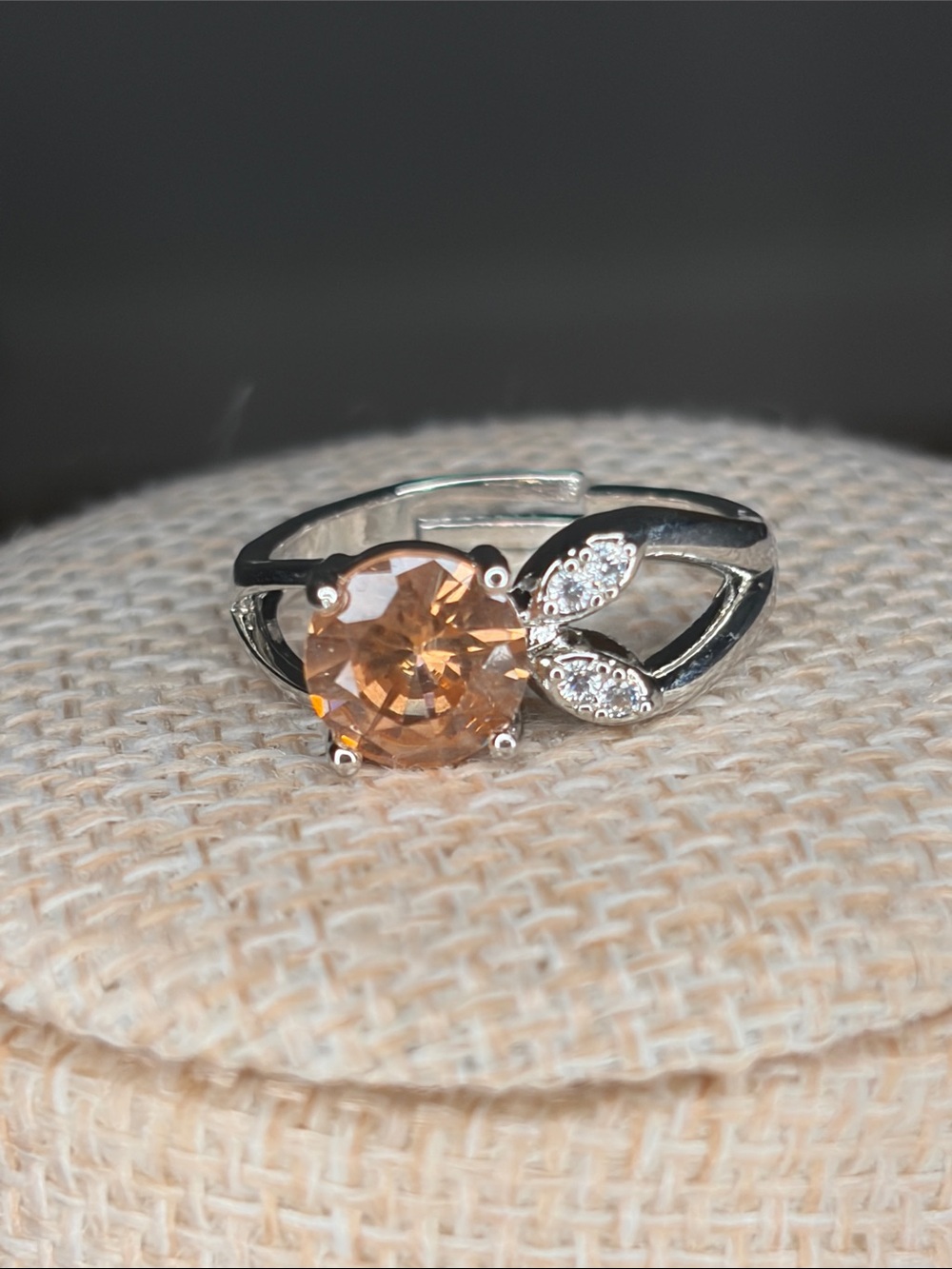 Silver Tone Ring with Champagne-Cut Center Stone and Accent Leaves Sz 7 adjust